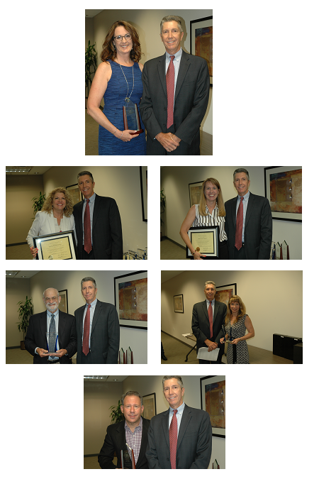 various board and committee members receiving awards for service